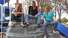 Mela, Georgia, and Vicktoria prepare to wet their jeans