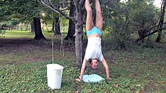 Georgia wets her panties outside while upside down