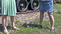 Vicktoria and Georgia wetting panties by an Army tank