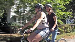 Mela and Beth ride a bicycle for two