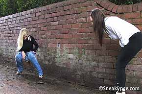 one girl desperate and one girl peeing