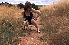 peeing in a field